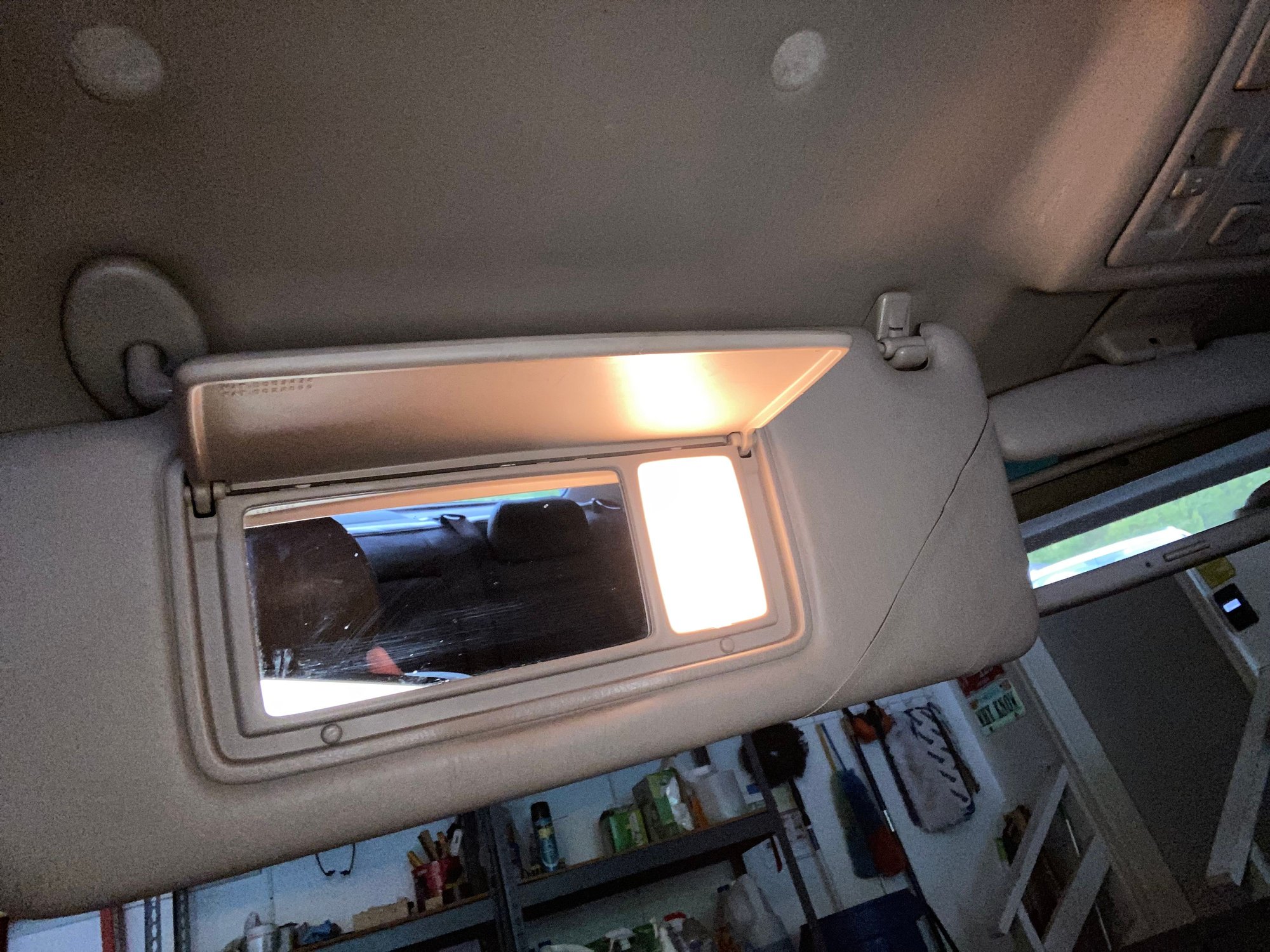 Driver side visor mirror light