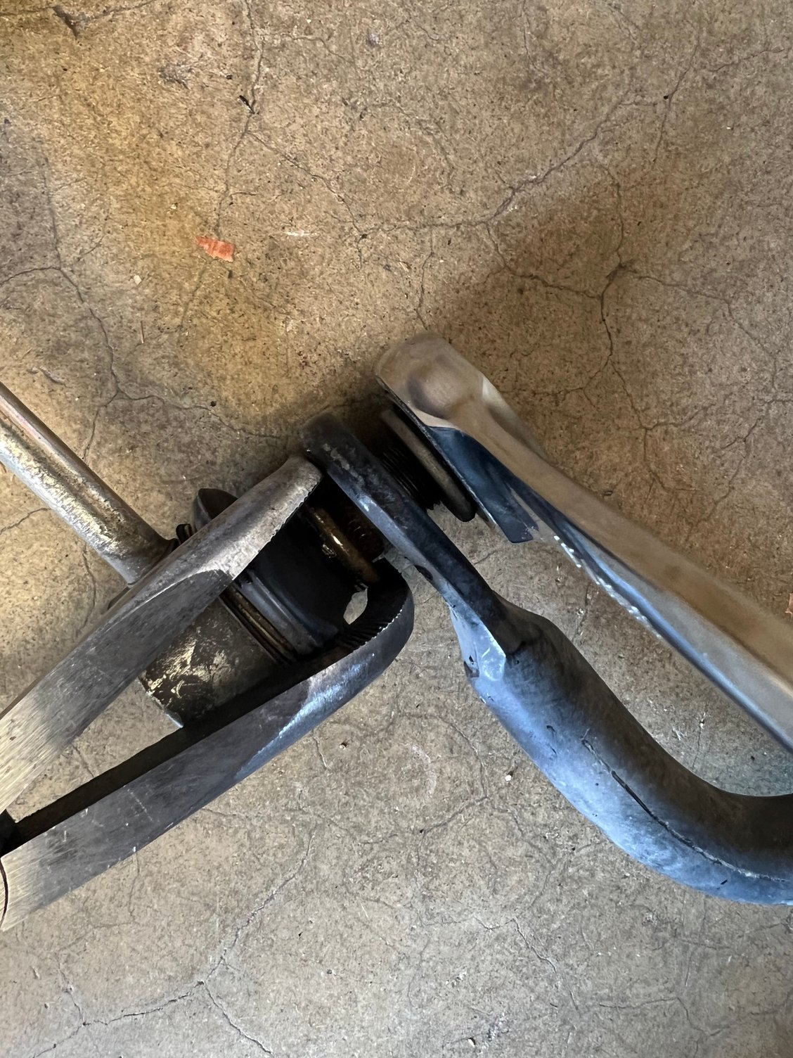 This was my solution to get it off. You will need to have a plier and  a ratchet/wrench. Apply pressure to the end link stud so it doesn�t move while using the ratchet/wrench to remove the bolt. 