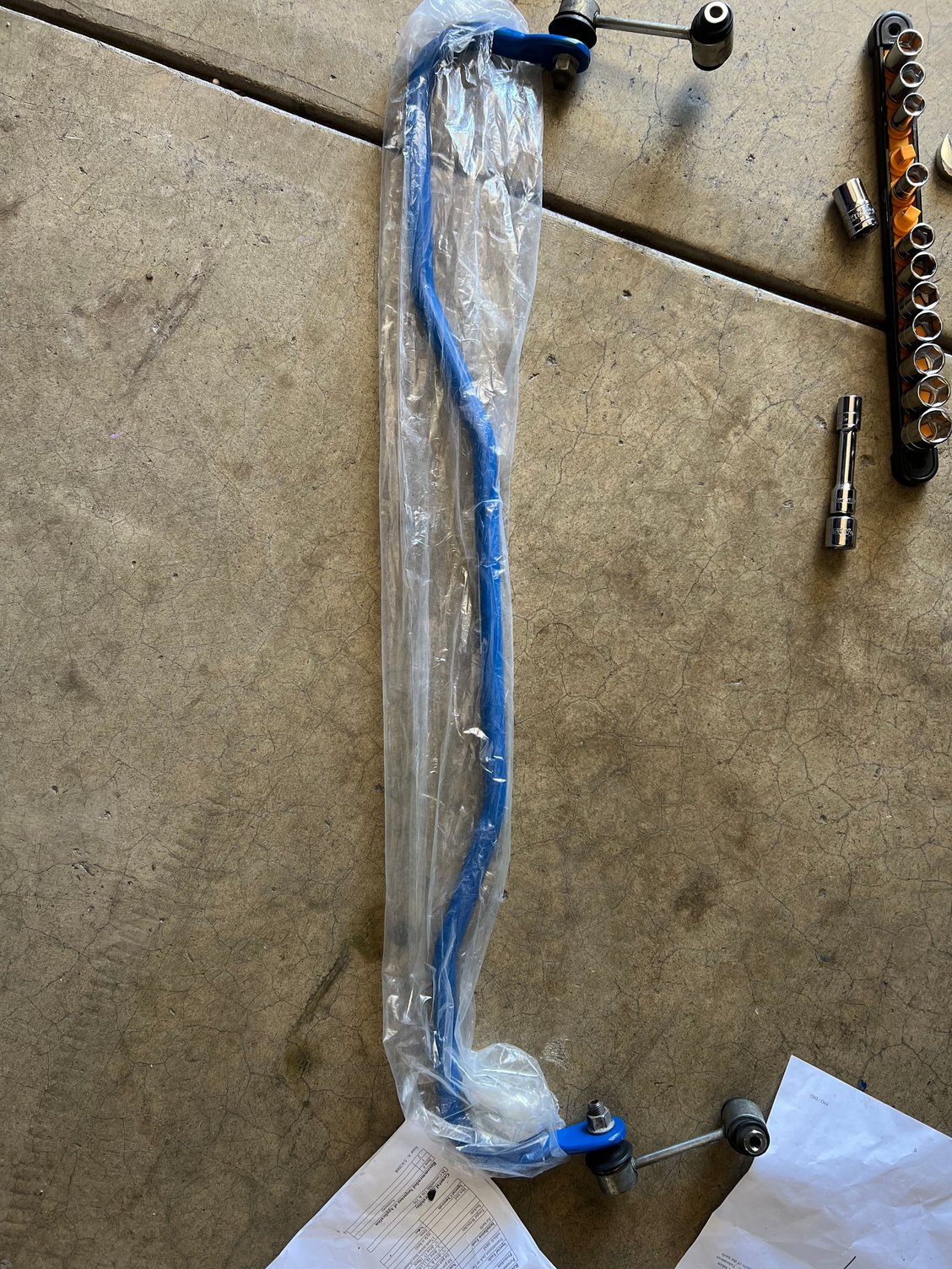 To prevent the sway bar from being damaging during install, I decided to install it with the packaging. Would recommend since it was a pain to get it in. I also installed the end links the same way I took them off since I know it would be an annoying to try to install while on the car. 