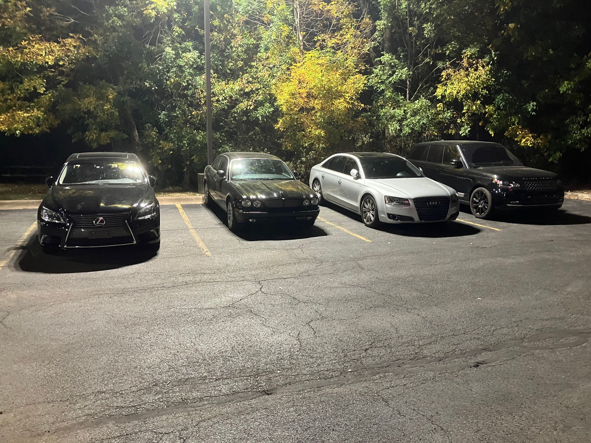 Hotel parking lot with friends and family, I'm the odd one out 