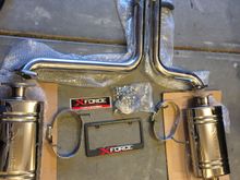 As mentioned earlier in this thread, the hangers are not made for us spec. The exhaust shop can weld a new location which is not a big deal.