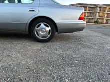 '98 LS400 rear wheel arrangement.  Stock tires and suspension, car completely empty.  
