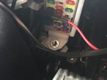 There is a empty slot with switched power supply as described on first post. Ground wire just off the screw where holding the fuse box.