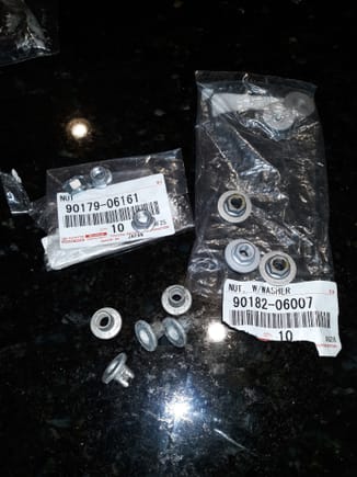 The original Aluminum nuts (bottom) have been superceded by 90179-06161....DO NOT USE these..the flange is too way small and will not cover the floor shield mounting holes.. When presented with these, I immediately climbed under a newer Lexus in showroom and ordered 90182-06007, which has large rotating flange. Painted them to avoid possibility of dissimilar metal corrosion. The Aluminum shields and nuts would have better durability
 had Toyota anodized...