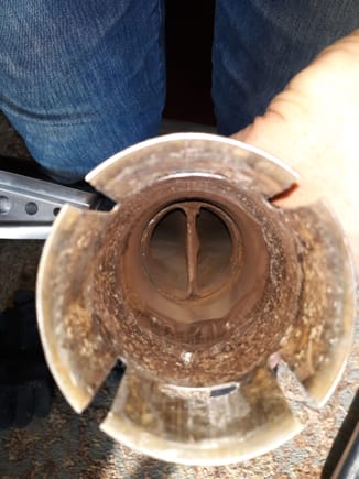Looking down throat of the center section that mates with front Y-pipe, depicting resonator tubes.
