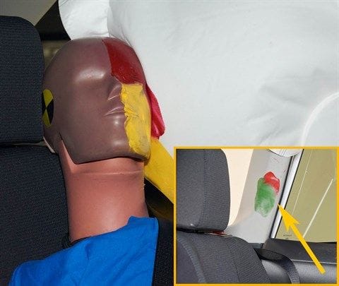 Smeared greasepaint shows where the rear passenger dummy's head struck the C-pillar (inset) despite the deployment of the side curtain airbag