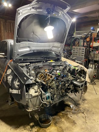 He was going to do valve seals in car, got annoyed and decided to just remove the heads. That lead to a "screw it why not" and just removed the whole powertrain. 
