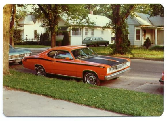 1977, bought a 1972 Plymouth Duster, 340 V8, auto, bucket seat for $700.