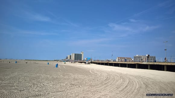 Expansive beach and boardwalk.