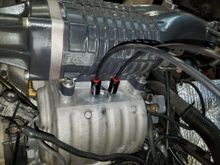Supercharger on with 1/2" ZZP spacer plat with 1/8" NPT for my meth/water nozzles. BARELY had any clearance for my Devils Own methanol/water injection nozzles.  Even ground the flat spot of the IM smooth for better clearance.  I have the left nozzle clocked so the line doesn't hit the rib on the SC putting it in a pinch.
