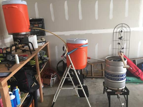 this is my hackjob 3 stage setup.  155*F water in the top tier igloo, wort at 152*F in mid tier igloo, Keggle to recieve sweet wort juice the bottom.