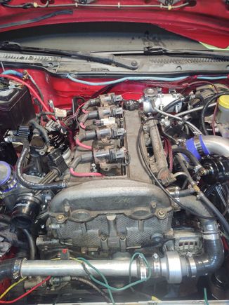 D585 LS coils, same settings as the LSJ COPs. Theoretically should work with a stock pcm. running 3ms dwell. this was mlre lf a troubleshooting measure and less of. An upgrade. They work great though, and readily available. I also cut and ran a fresh AN 10 oil cooler line to the side of the radiator. It cleaned up the bay massively