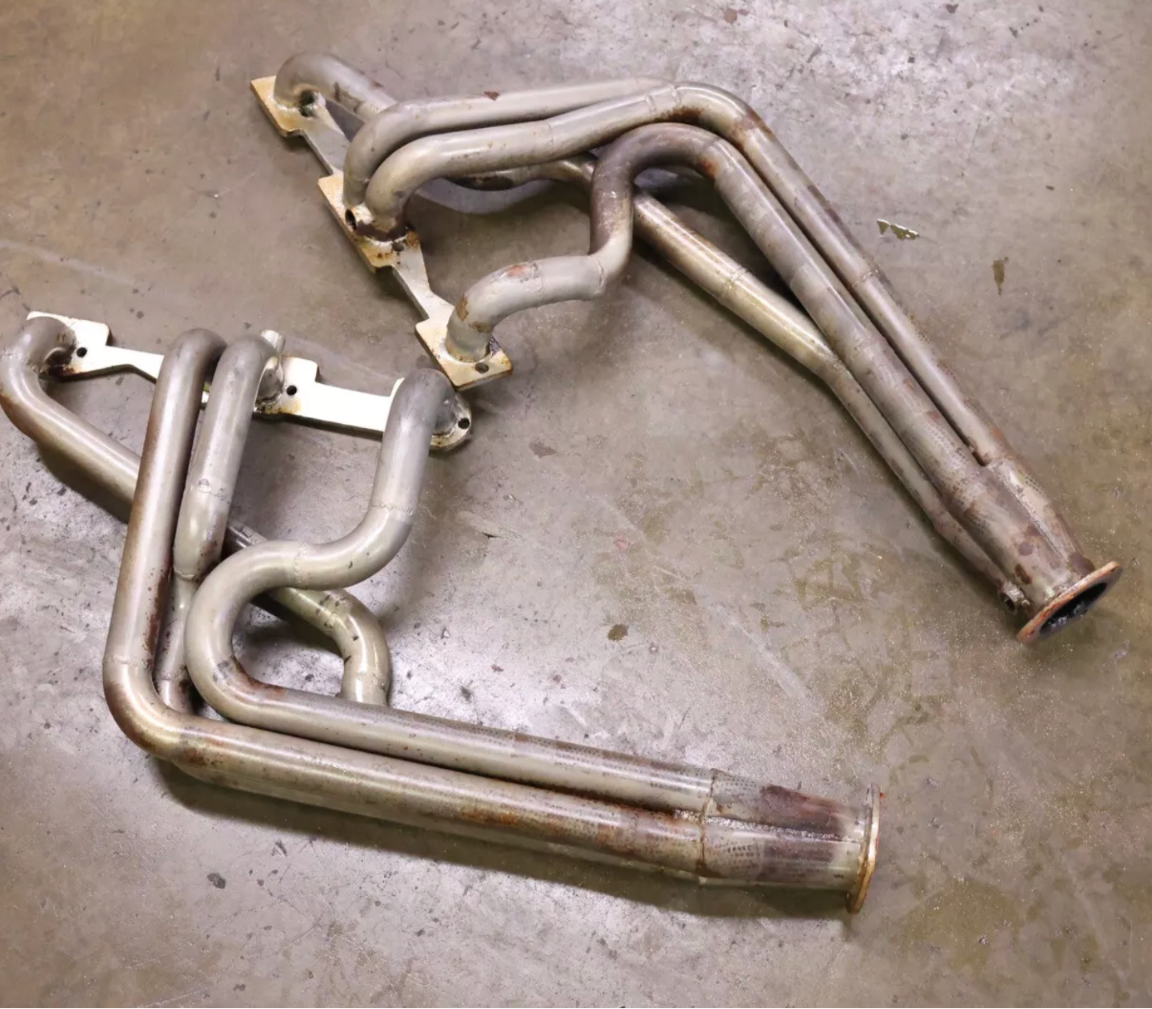 These things are loong, I'll have to cut my Y pipe back a bit weld in a new flange. These come with the bung welded in on both sides but they are so far back I'm afraid the O2 sensor is going to hit my shifter linkage. I may have to get a wiring harness extension and put it on the other side.