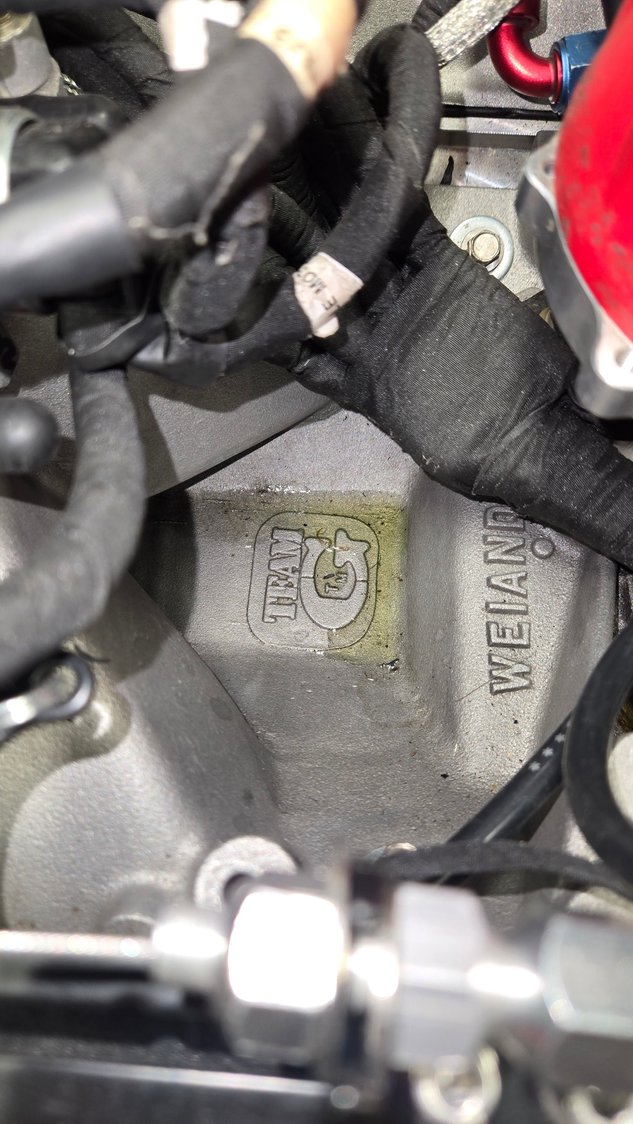 Odd oil pooling in bottom of intake when cranking