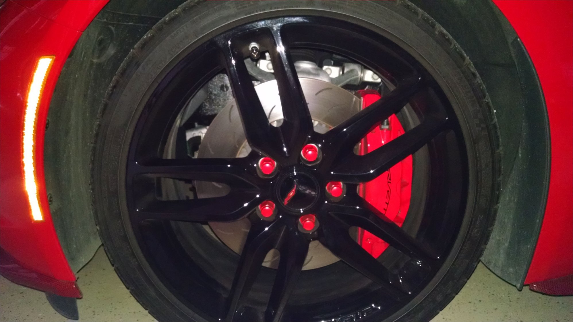 black rims red lug nuts