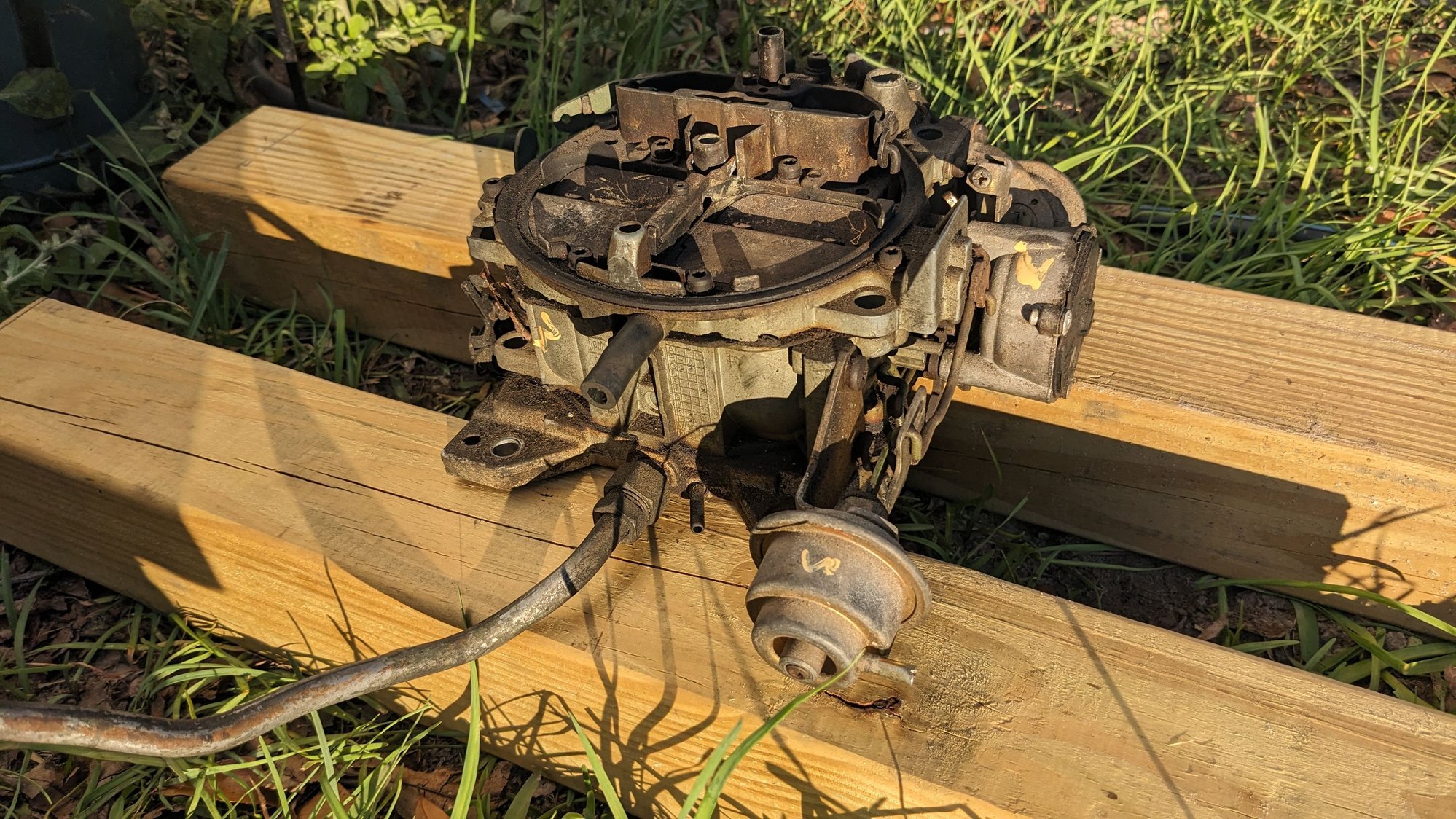 Donor Quadrajet. May not use it, but should be a good model to play with and practice on.
