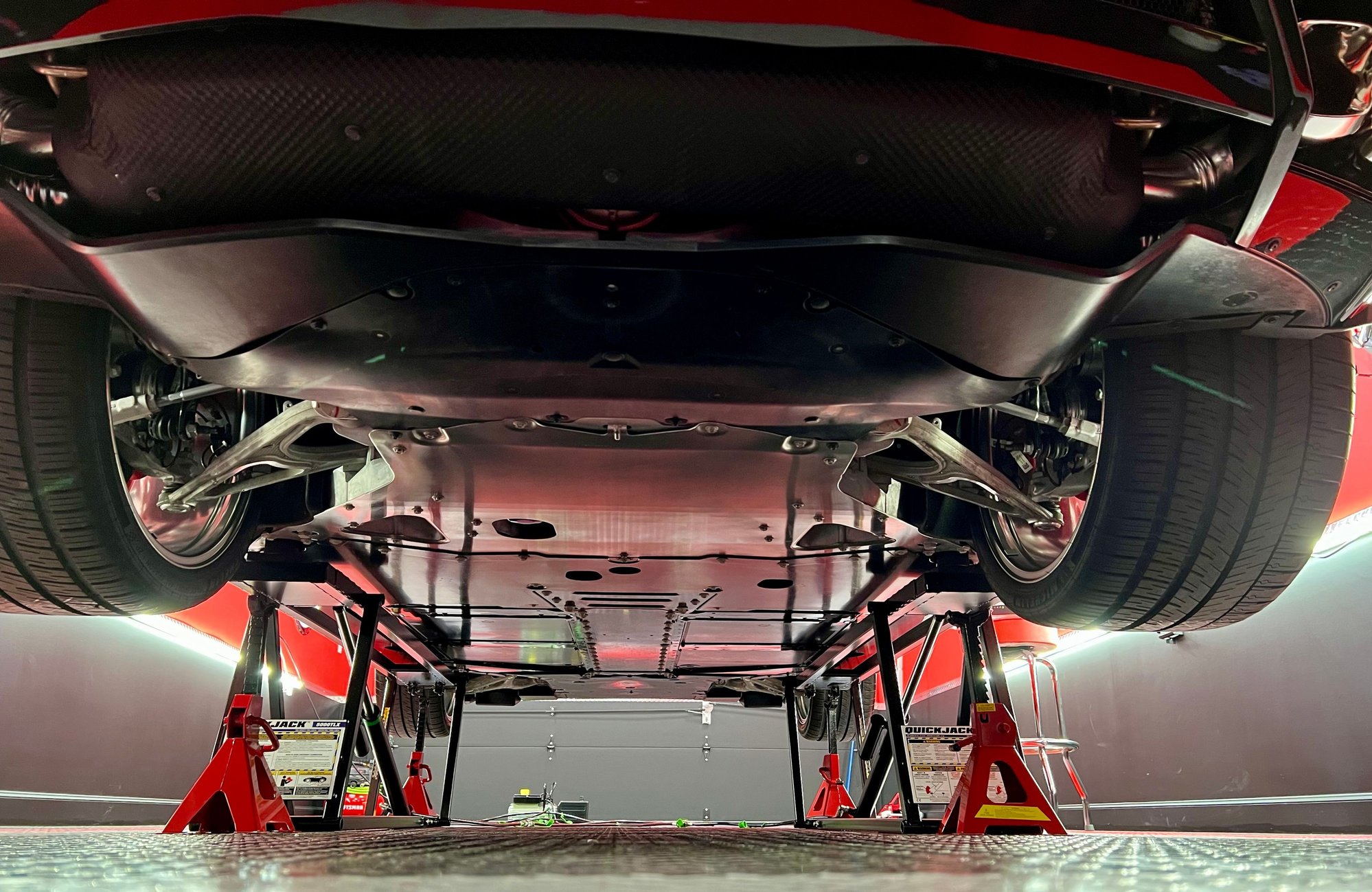 The underside is cleaned and buffed...ceramic coating is added.