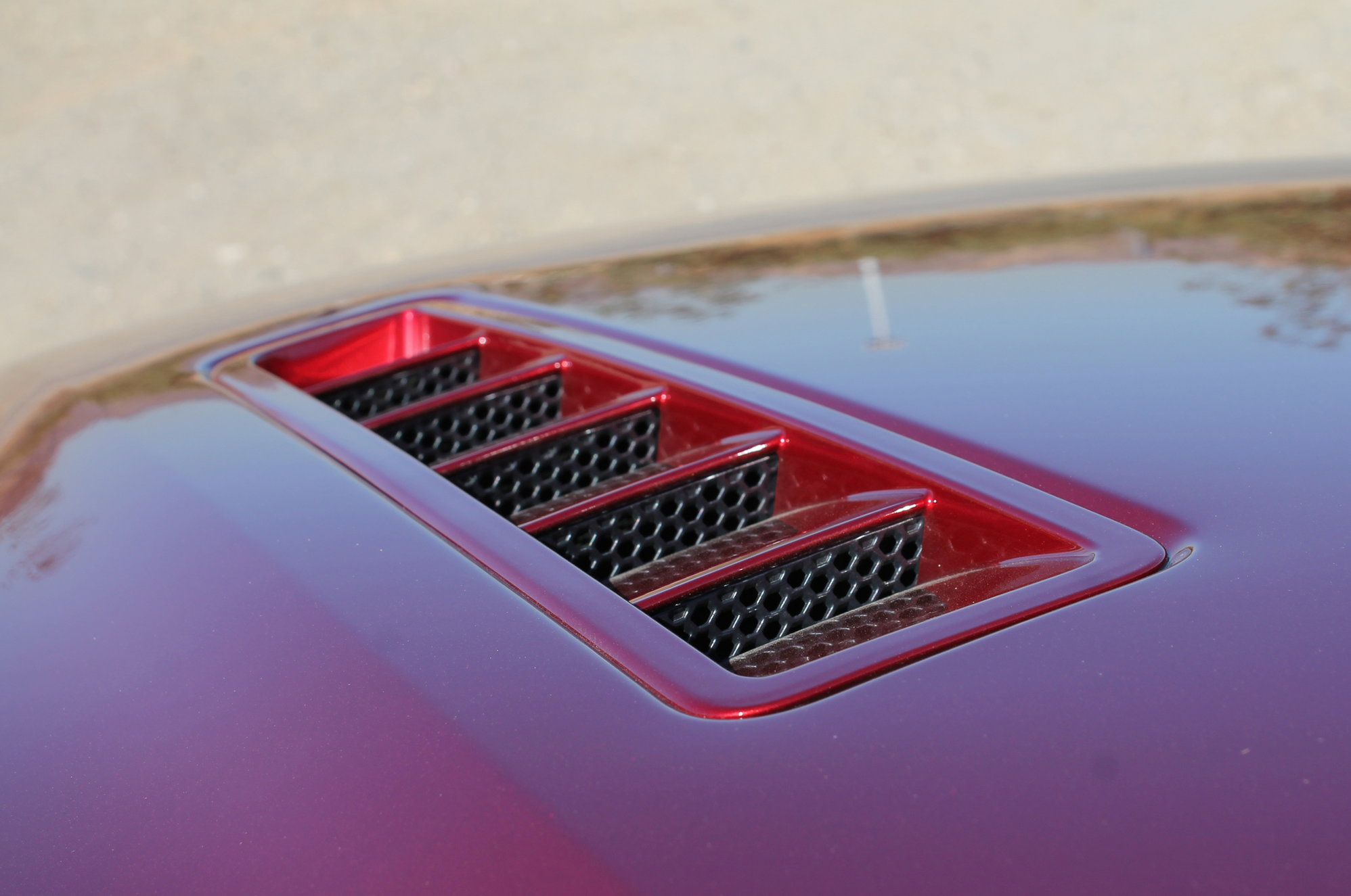 Camaro AND Mustang hood vents in a Corvette? 