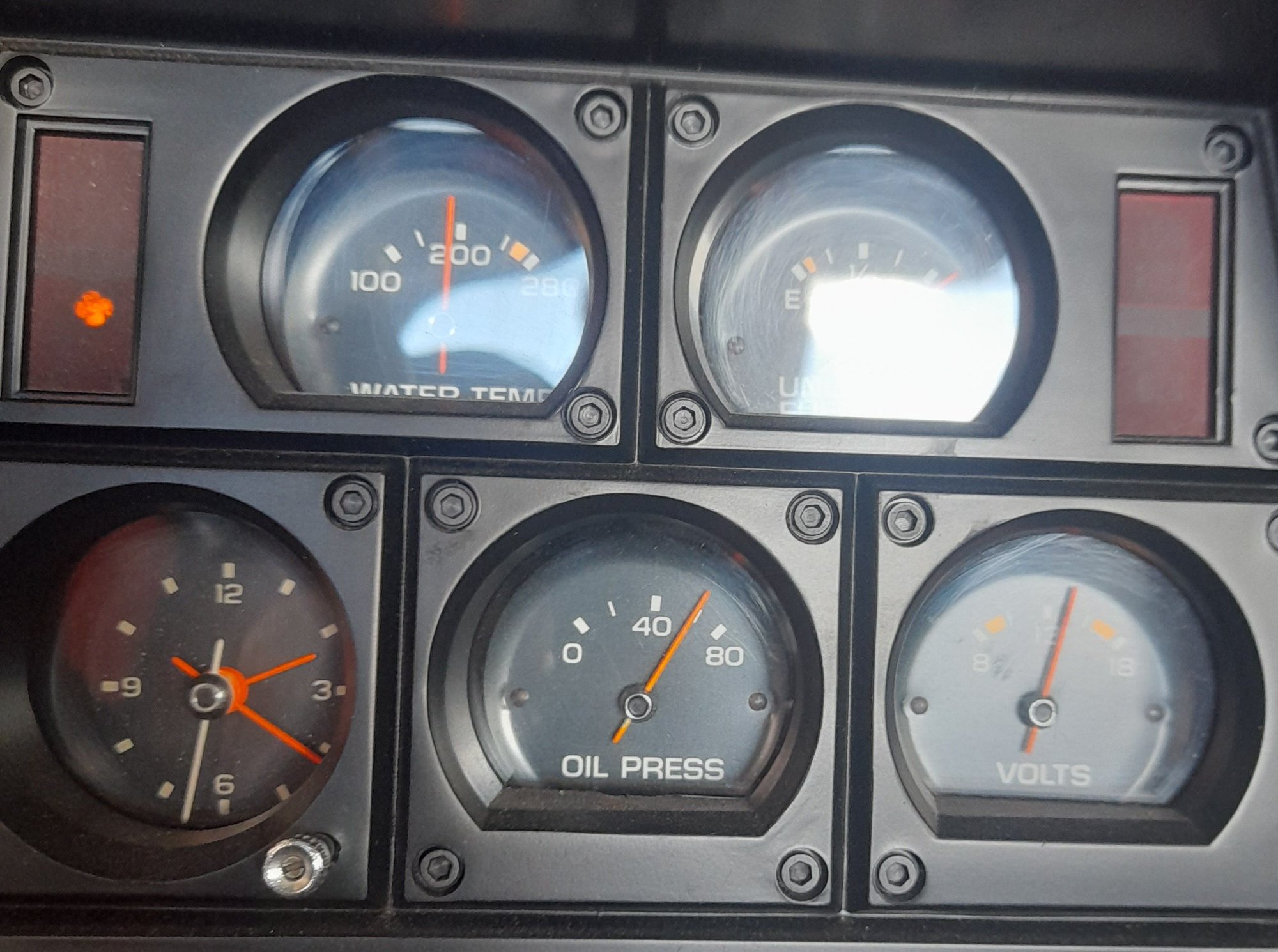Engine idling and warmed up. 