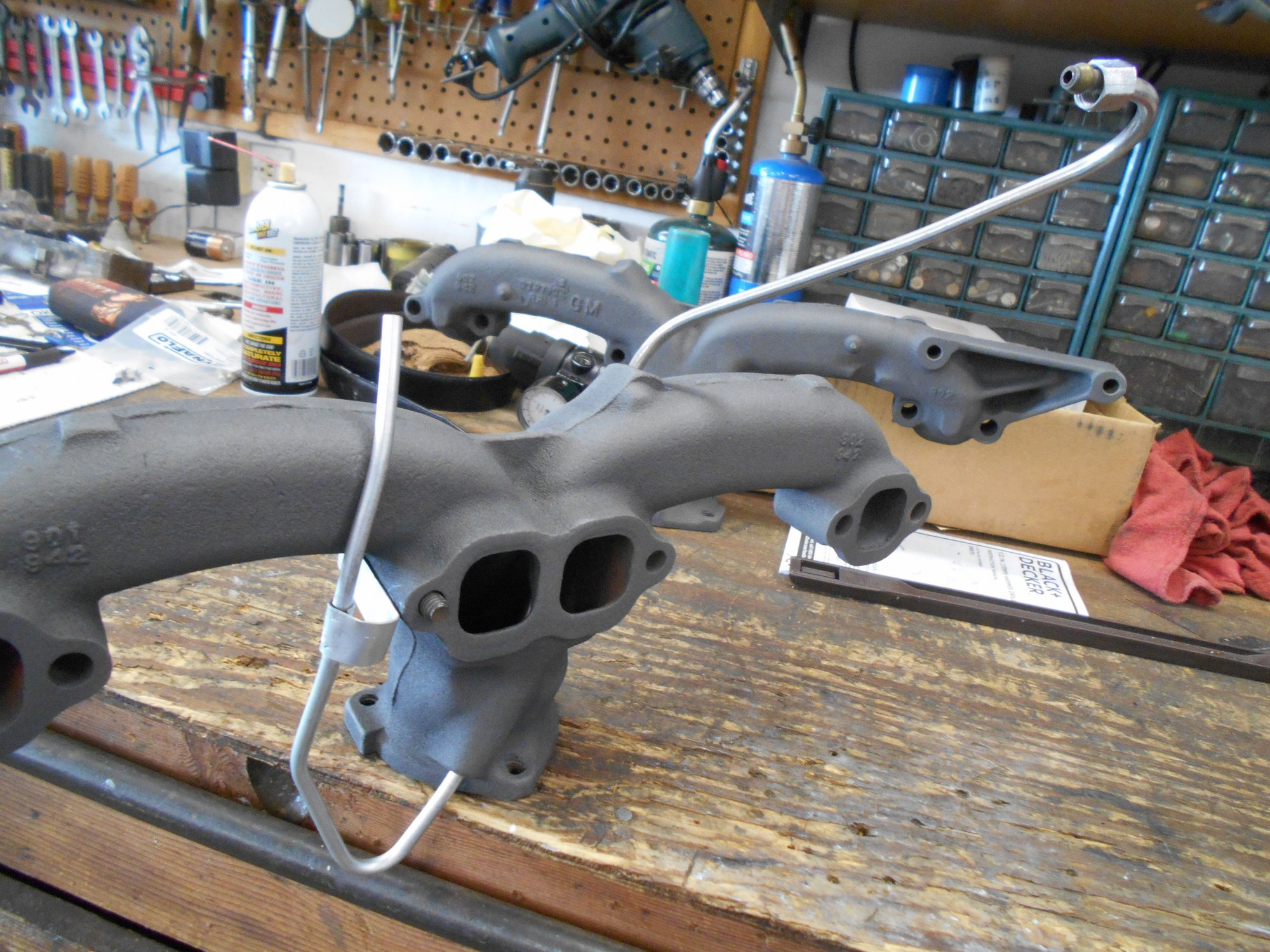 1959 exhaust manifold Passenger side and the Choke Tube CorvetteForum