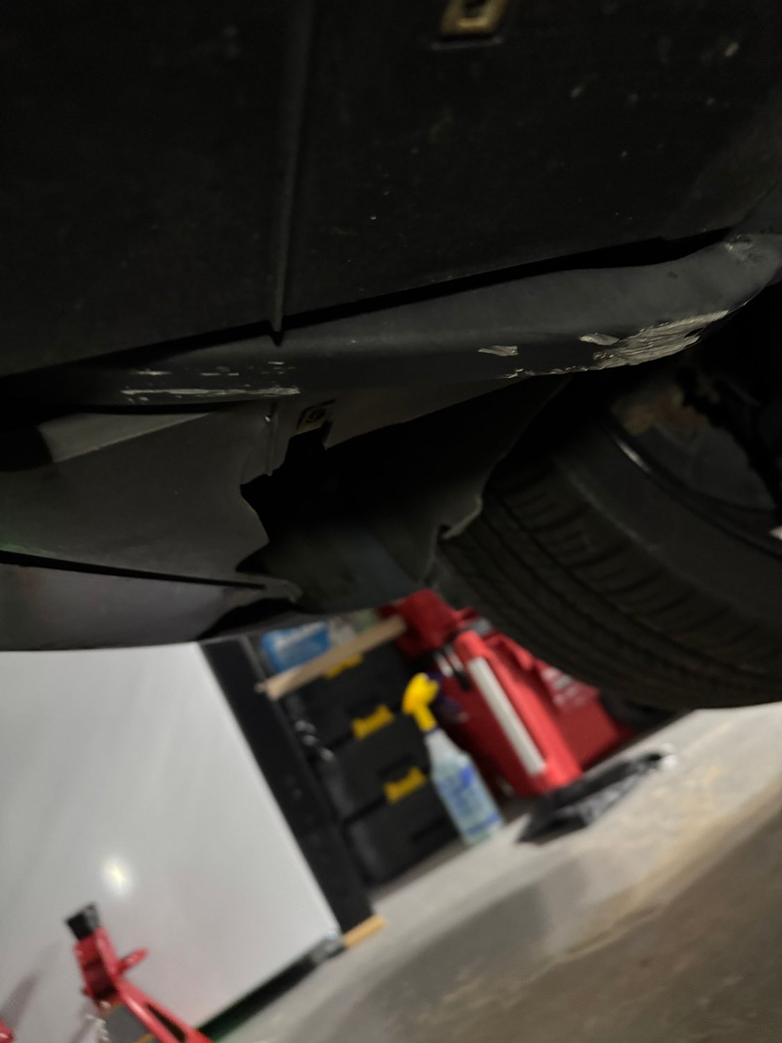 passenger side under bumper