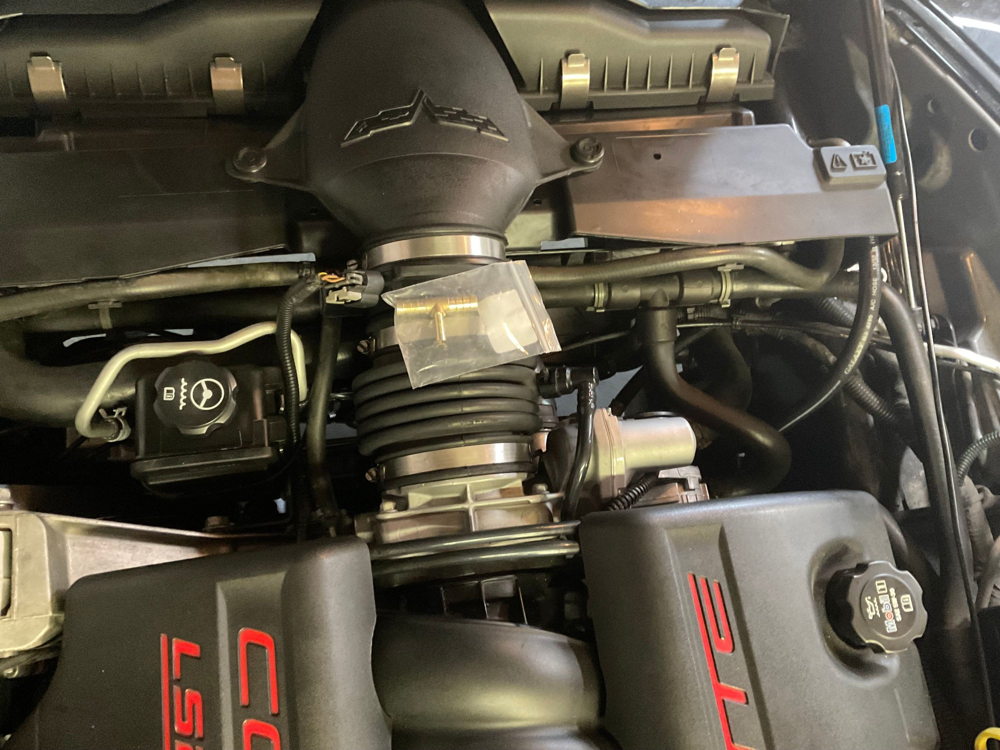 I also replaced the plastic T on the coolant lines under the MAF here since the plastic one broke.  They’re all going to break.   I used a brass one from Amazon.  3/8x3/8x1/4