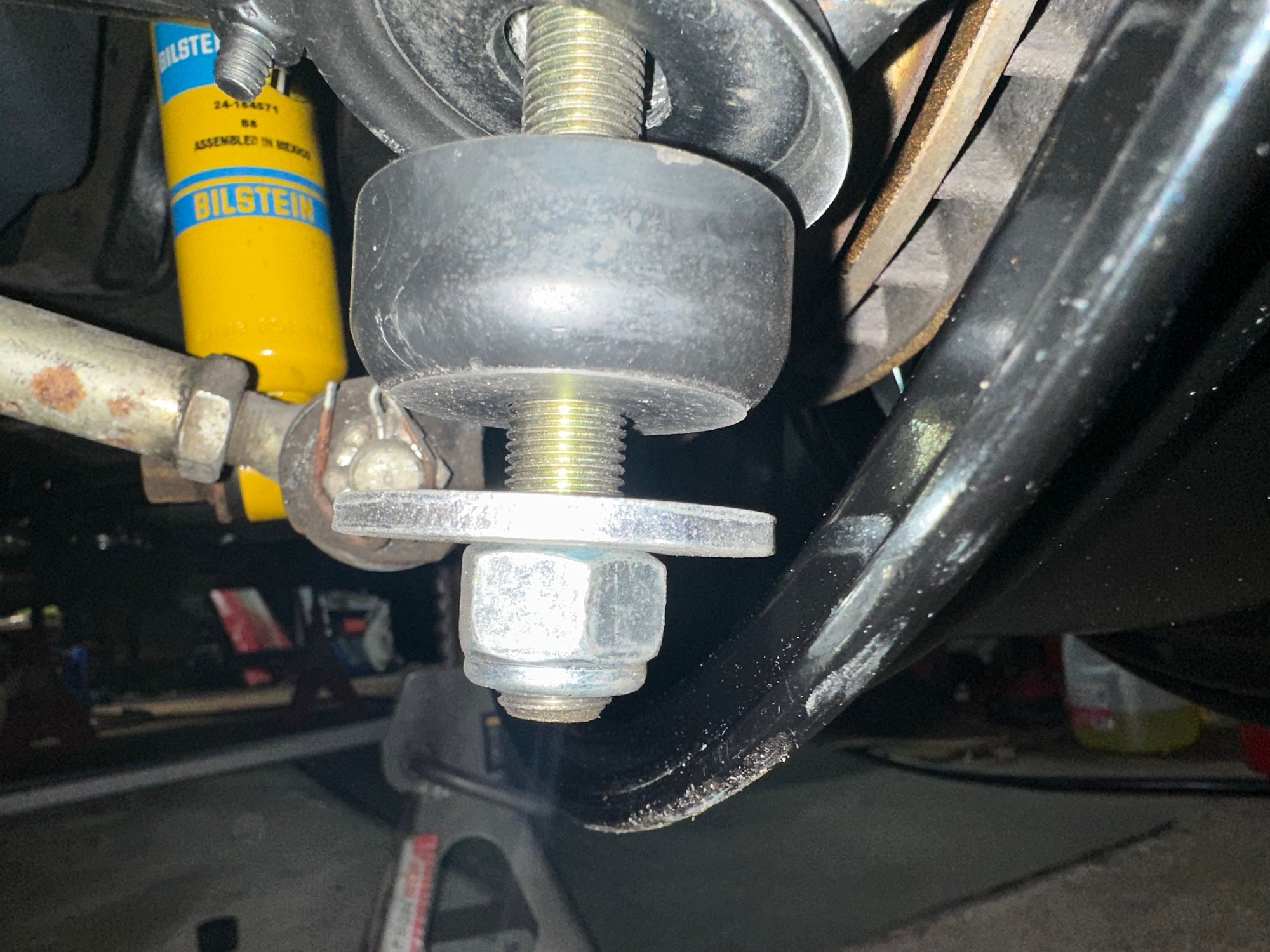 With 5mm spacer wheel to spring bolt Washer