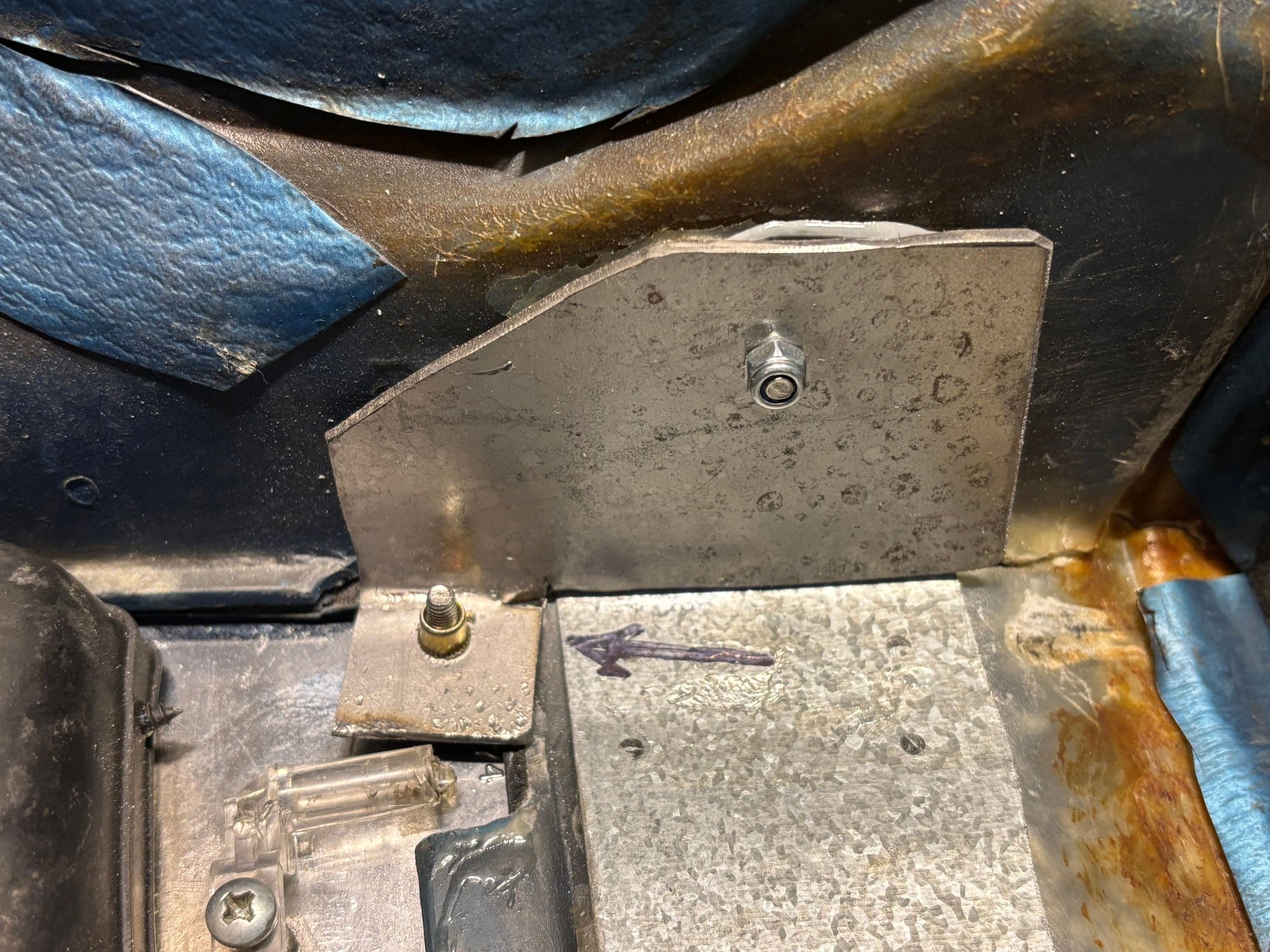 This is 14 gauge steel for the faceplate bracket.   I used a threaded rivet for each corner.  There is also a piece of galvanized steel (21 gauge?) to assist the console with keeping its shape. 
