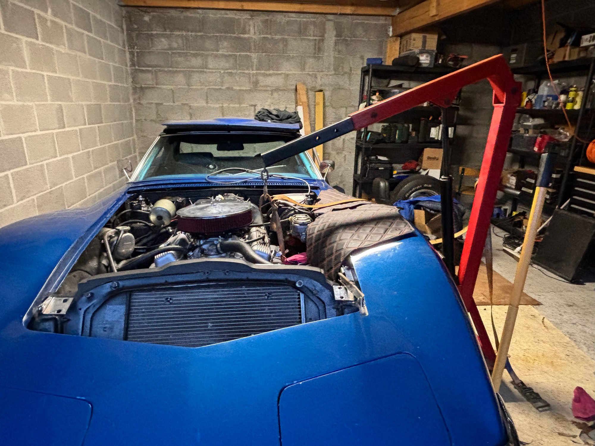 Just enough room to slightly lift engine. 
