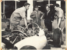 Laurie Craig & Stirling Moss discussing Moss's 1960 Ardmore New Zealand Grand Prix car before race