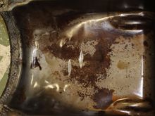 Oil pan contains evidence of an earlier major engine issue.