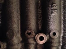 This is my old valve body, it is stamped GM and D 15 above.  Notice between the two photos the casing on the old does not have a hole all the way to the left, on the new one it does.