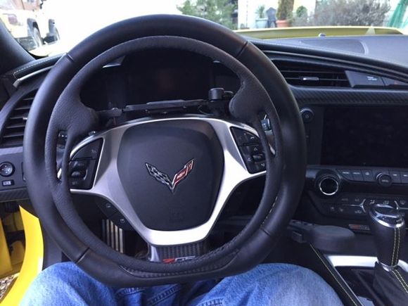 Guido Simplex hand controls. The ring on the steering wheel is my throttle - squeeze for acceleration so you can drive with both hands on the wheel! The brake is just above my right knee. The system is light years ahead of other hand control systems I've used.
