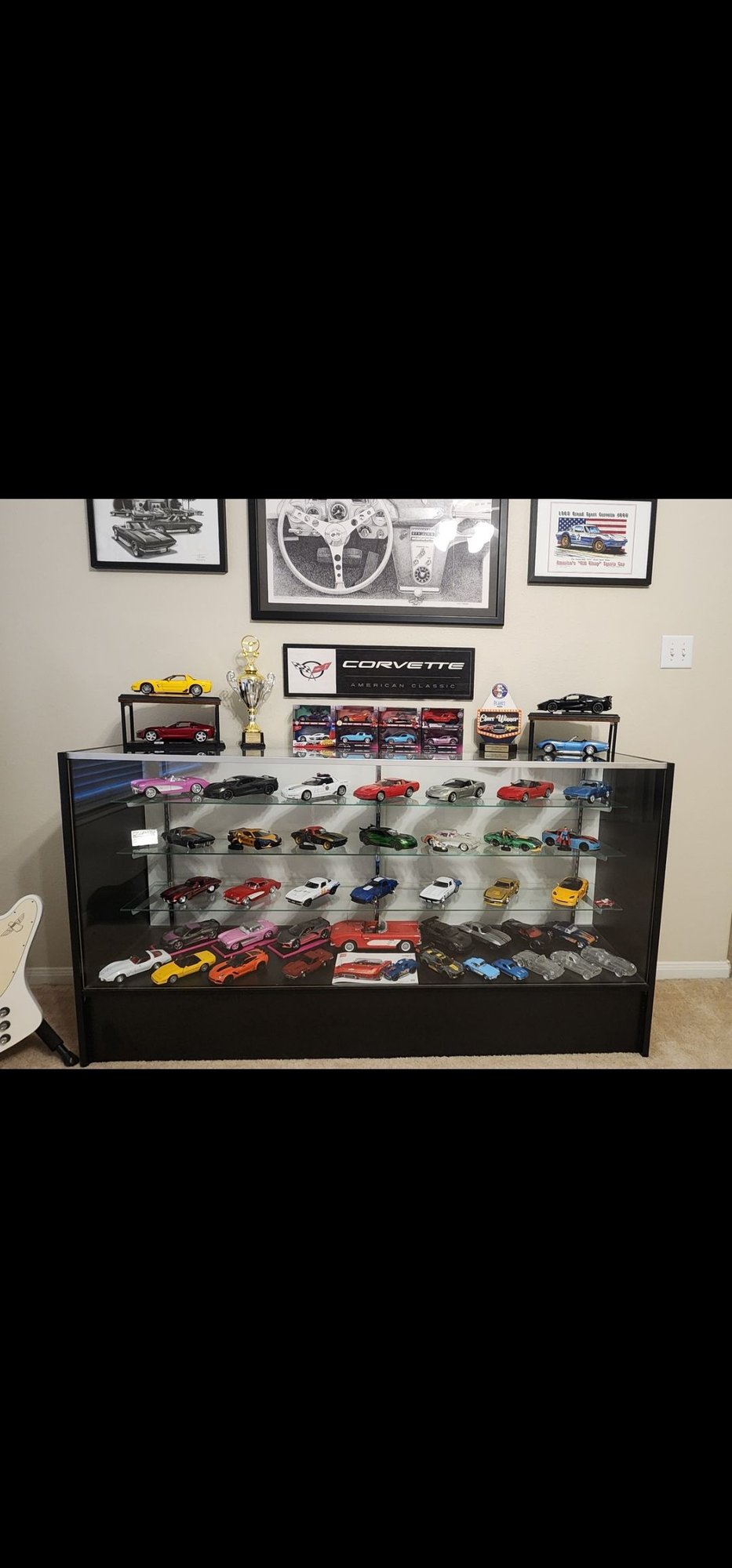 Even my game room area is starting to grow. Had to add a 3rd shelf to the display case. 