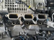 Intake manifold off looking into head ports. TB is off also