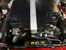 The larger airbox fits nicely and beefs-up the overall appearance in the engine bay. One wonders why they went with the smaller OEM air intake set-up in the first place.
