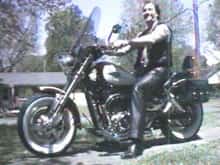 Here's me in my front yard sitting on my 1998 Suzuki Marauder.  I am a fair-weather rider, and the rule is, 65deg and above, let's ride!
