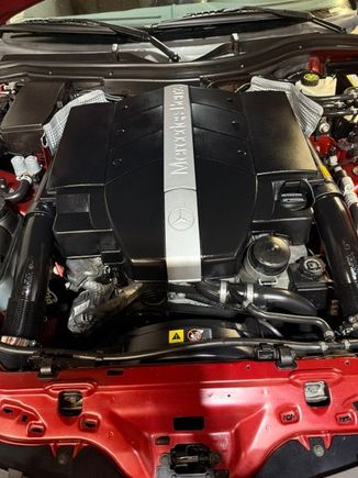 The larger airbox fits nicely and beefs-up the overall appearance in the engine bay. One wonders why they went with the smaller OEM air intake set-up in the first place.
