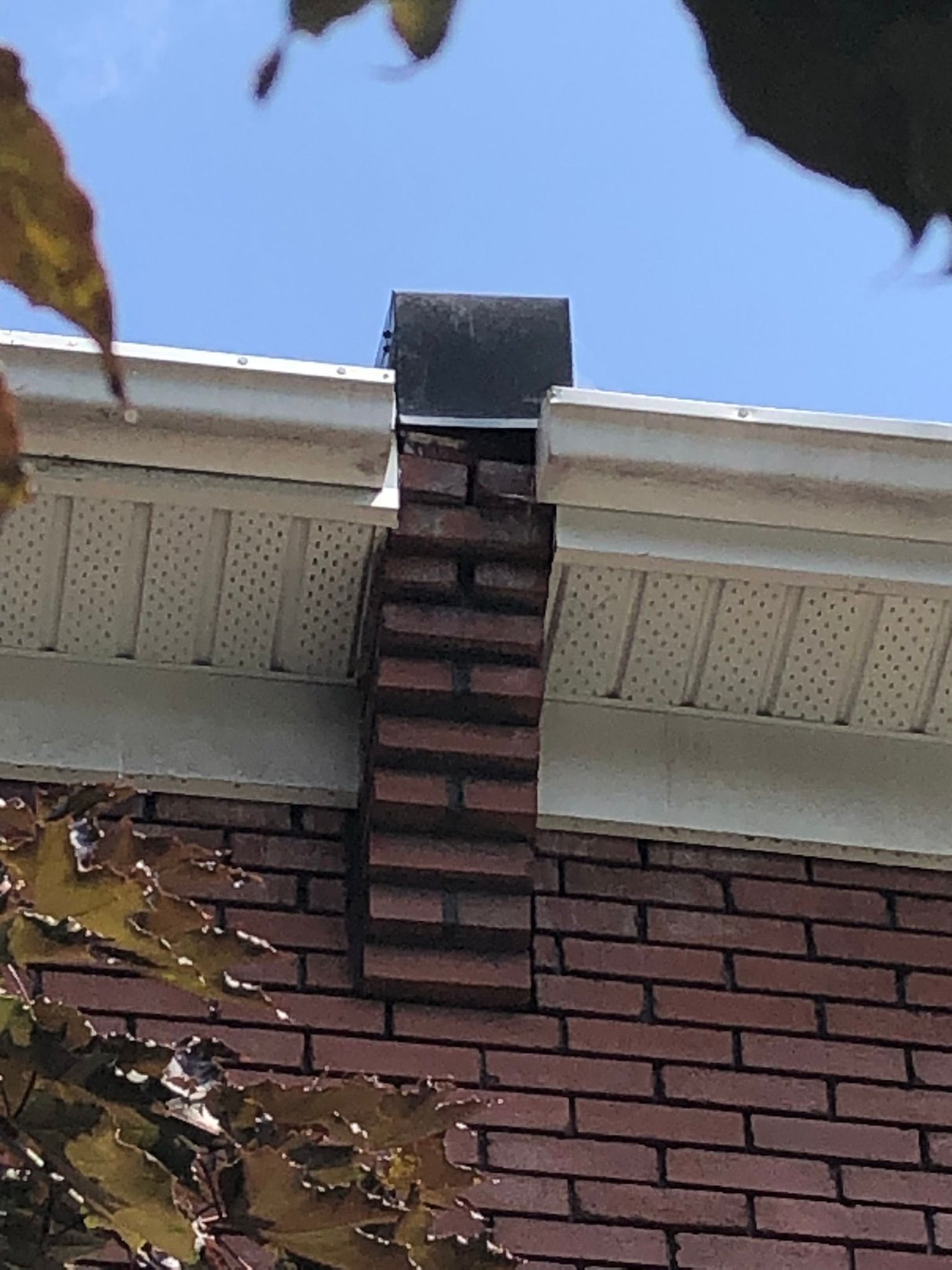 Gap between brick wall and roof fascia/soffit/gutter