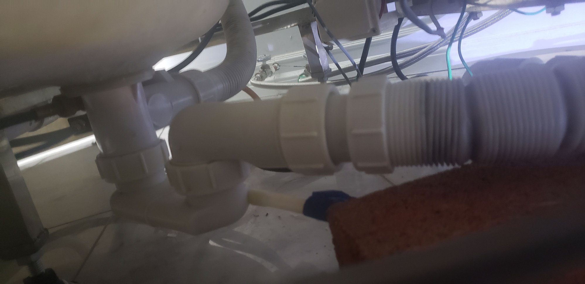 Steam Shower with Flexible Drain Pipe not Draining Properly