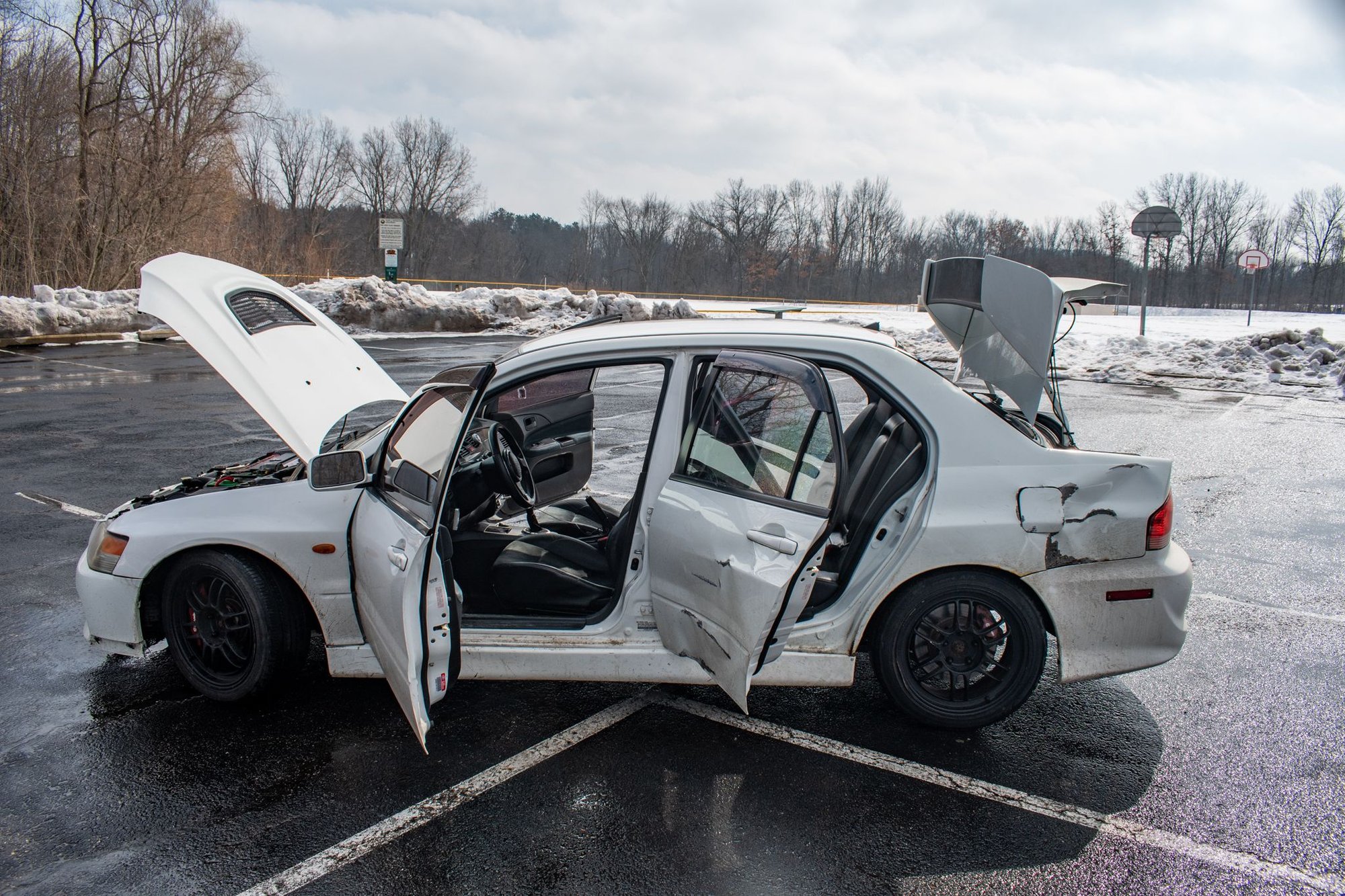 2006 Mitsubishi Lancer Evolution - 2006 Mitsubishi Lancer Evo IX GSR - Used - VIN JA3AH86C16U056381 - 160,000 Miles - 4 cyl - AWD - Manual - Sedan - White - Grand Rapids, MI 49546, United States