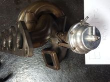 T3 tubular manifold with tial 38mm wastegate, Garrett 3071 ball bearing turbo,02 housing 1700. More pictures below