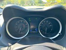 Gauge cluster showing current mileage taken Sunday, Oct 6th