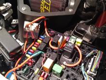 Removed fuel pump relay and tap those pins to control a solid state relay 