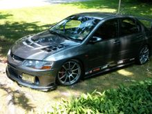 Full Cusco 7-point roll cage, Complete Cusco chassis bracing kit. ADVAN RS rims.