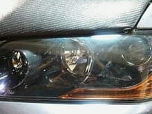 One of three sets of carbon fiber head light housing made in Japan.