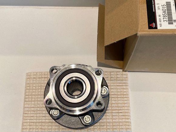 ^ Mitsubishi OEM wheel bearing 3785A015. It comes with all five wheel studs installed.