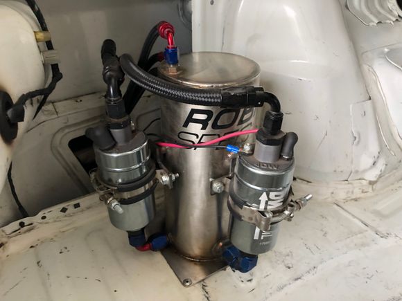 Twin fuel pumps pulling from surge tank. 