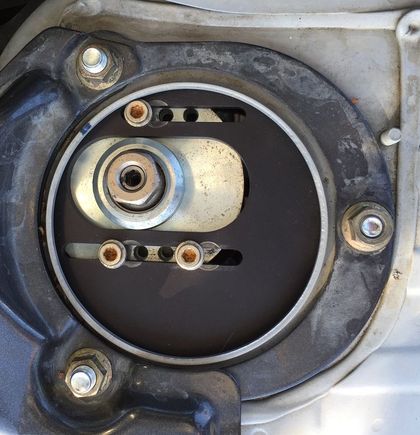 Driver side, -3deg camber, 5.6deg caster. Strut camber bolt in the -1deg position.