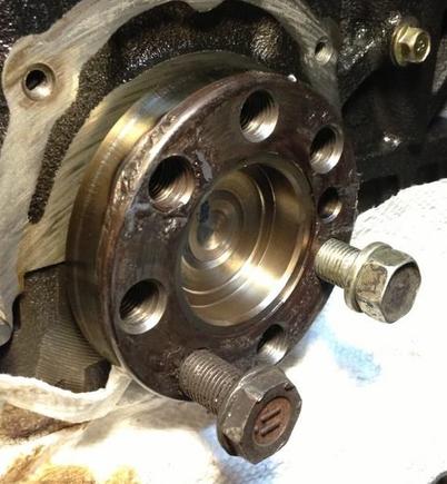 WTH happened to my crank? It looks like someone was welding the flywheels and melted the end of the crank due to thermal transfer thru the bolts.